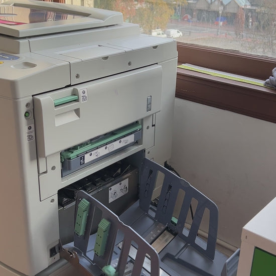 Risograph printer printing the mini I Love You prints