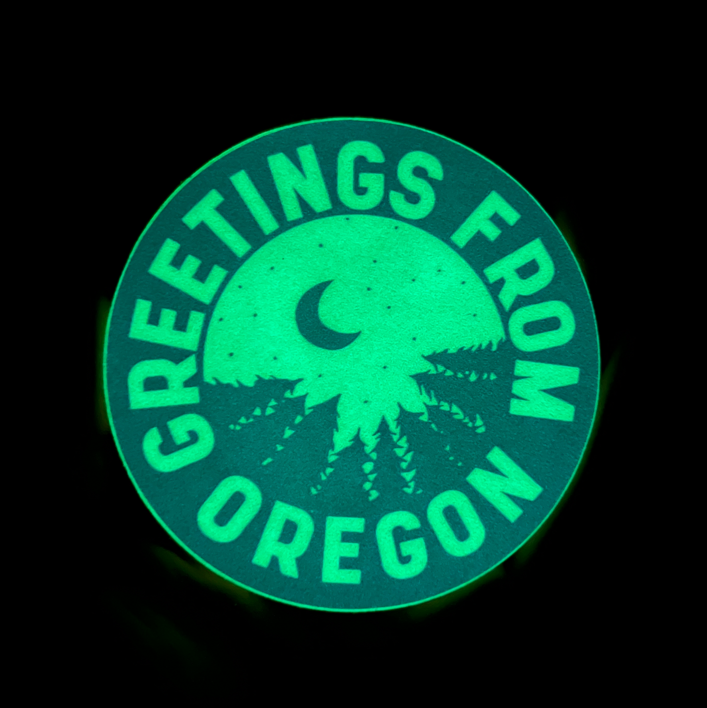 The greetings from oregon sticker glowing in the dark